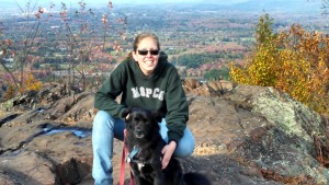 dog and woman mountaintop